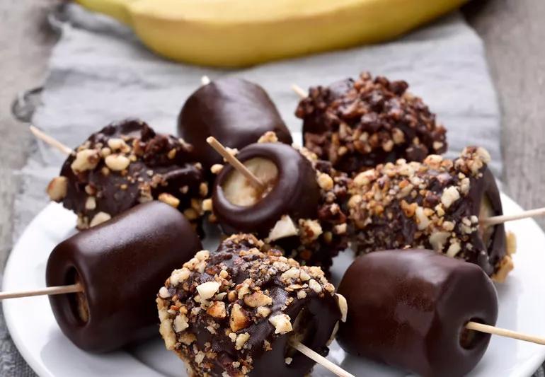 Frozen banana bites dipped in chocolate