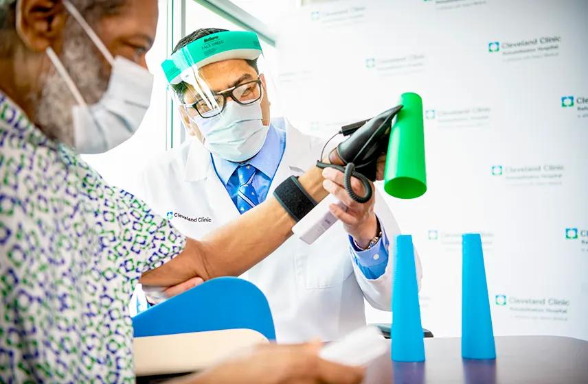 Cleveland Clinic doctor working with a patient.