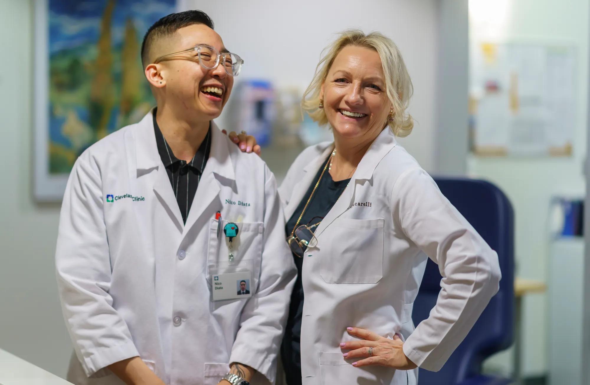 Cleveland Clinic providers conversing in a hallway.