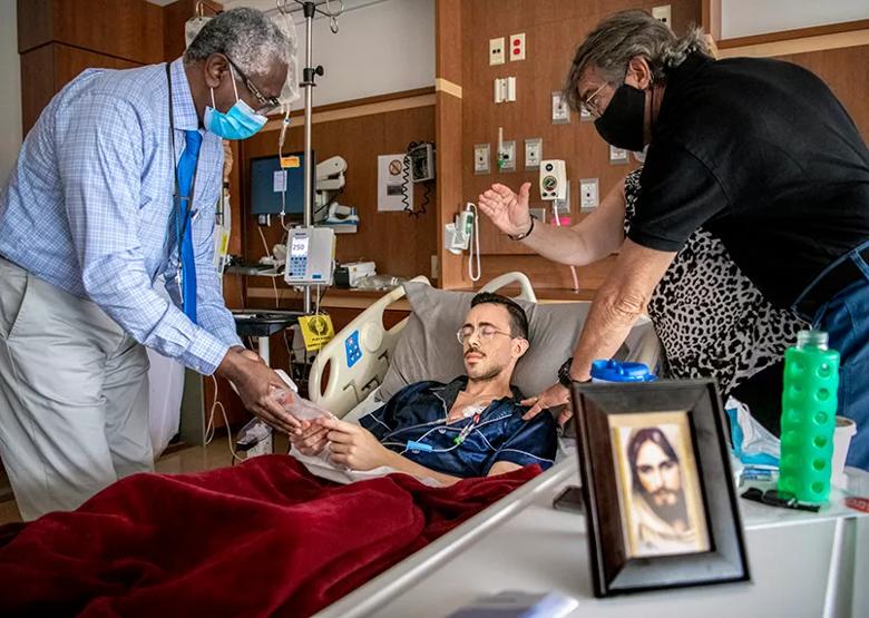 Spiritual care professional with patient