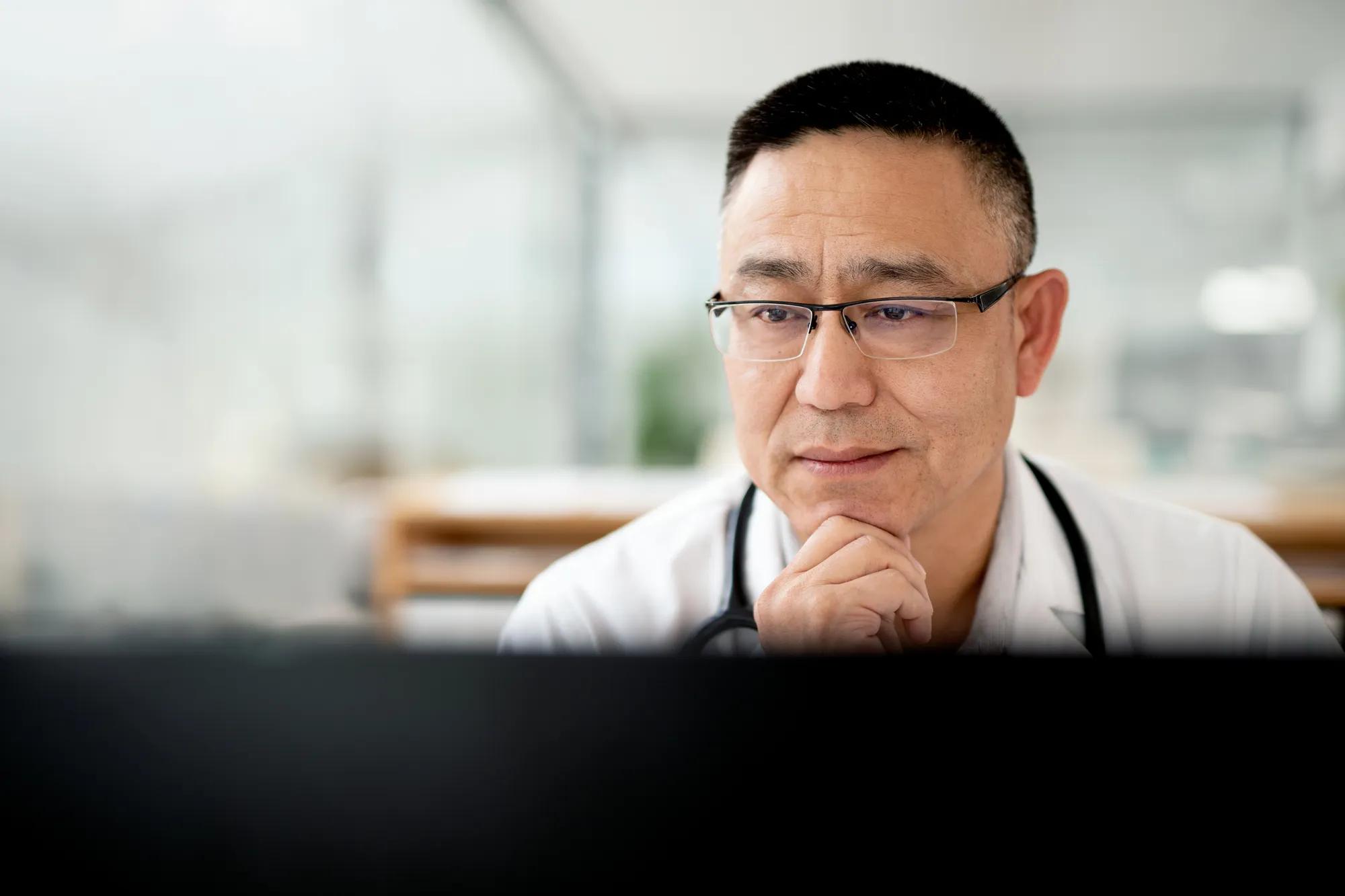 Caregiver looking at MyPractice system
