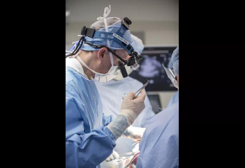 Dr. Cass closes the hysterotomy.