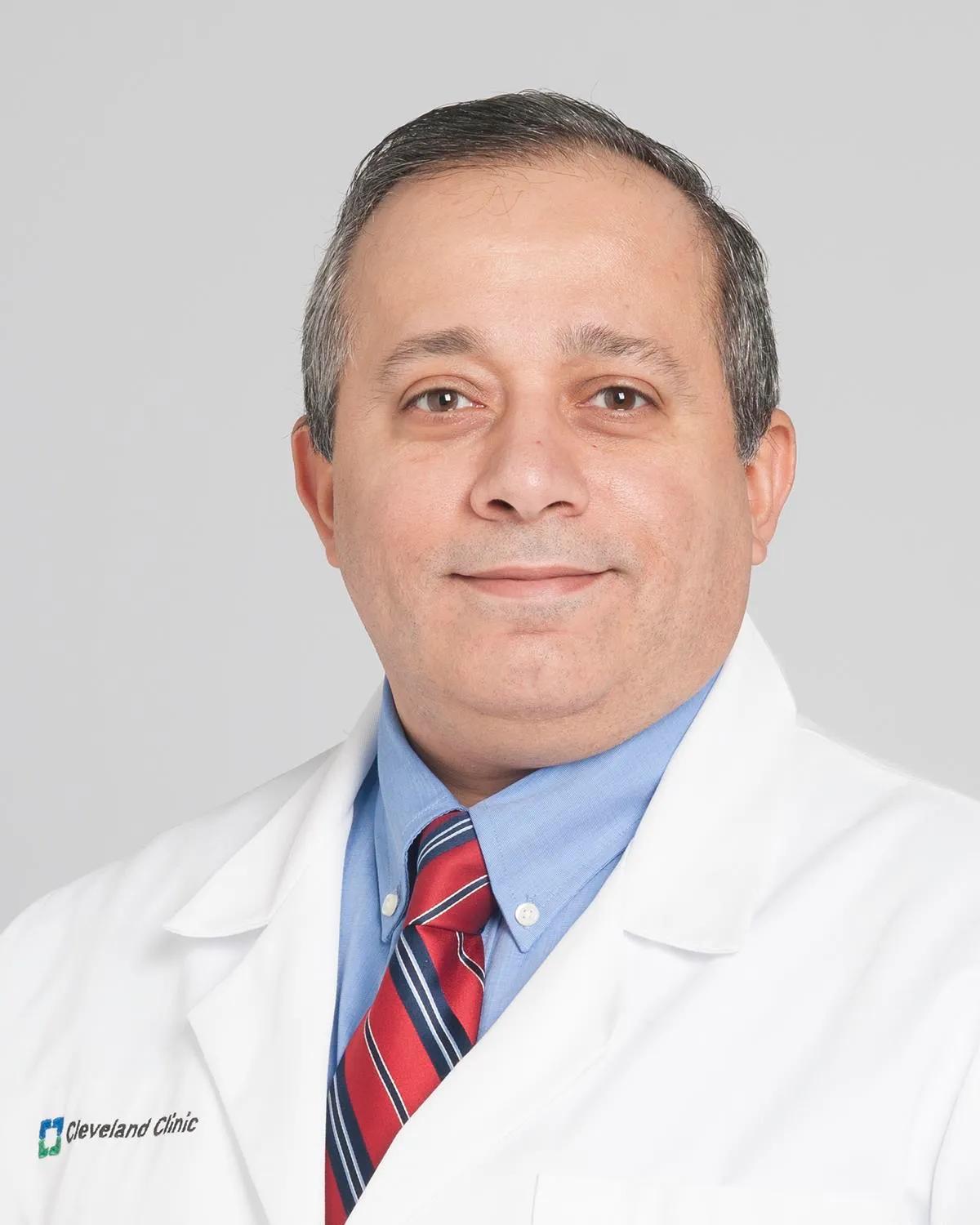 Albair Guirguis, MD