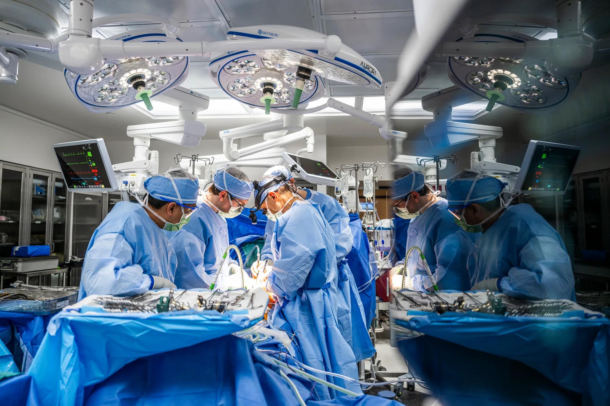 Suregeons performing heart surgery