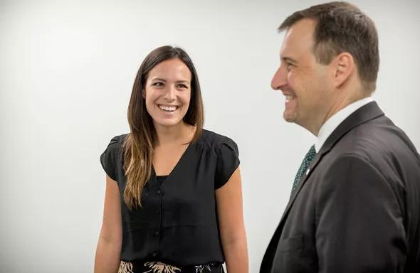 First year medical student, Stephanie Saridakis [left], laughs with Isaac Kirstein, D.O., Dean of the Cleveland campus.