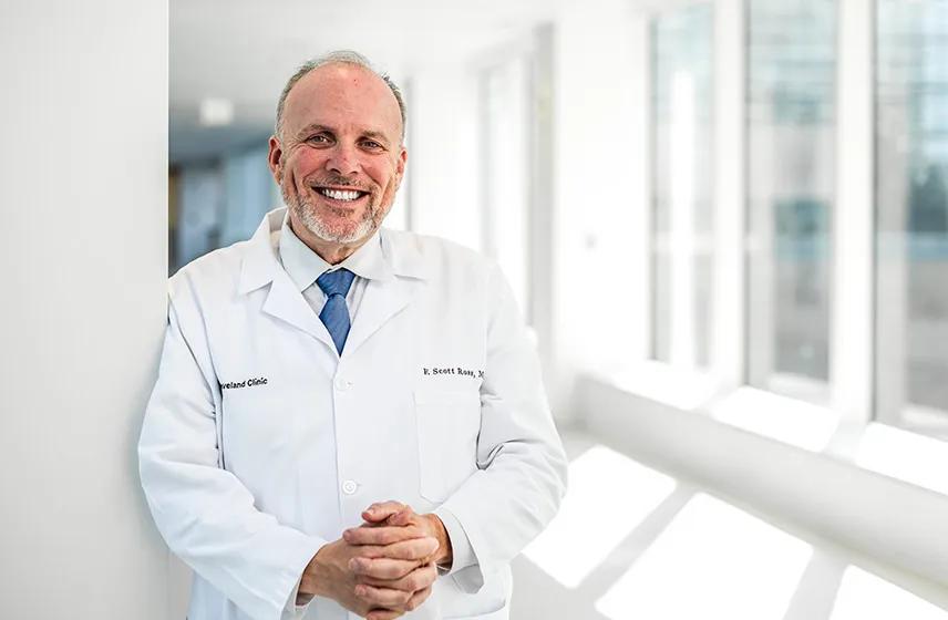 Cleveland Clinic provider smiling in a well lit hallway