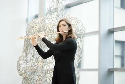 Woman playing a flute at Cleveland Clinic Main Campus