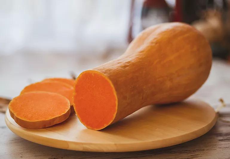 Butternut squash on the wooden table