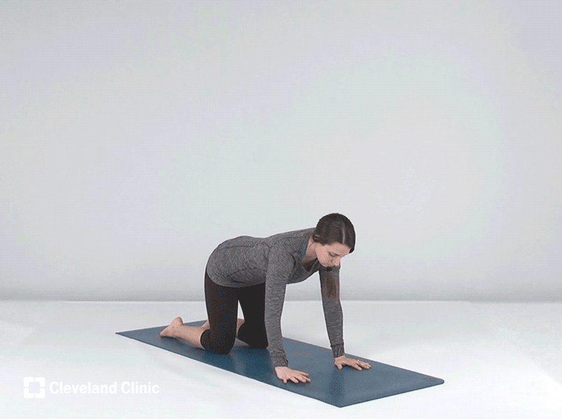 Person doing tabletop balance yoga pose