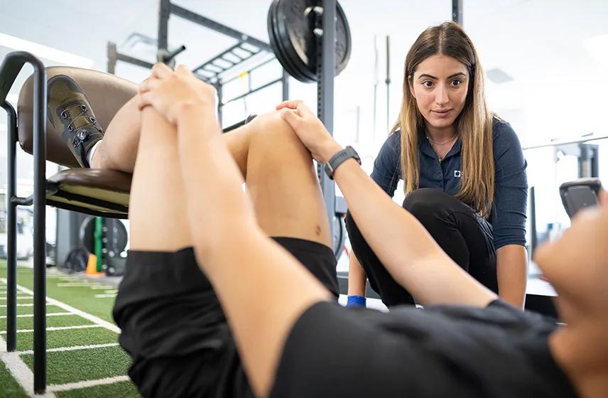 Patient in training session with sports health provider