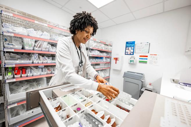 Nurse managing medications