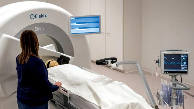 person going into a Gamma Knife machine for radiotherapy