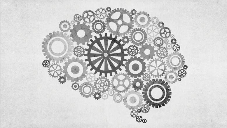 stylized illustration of human brain made up of cogs and wheels