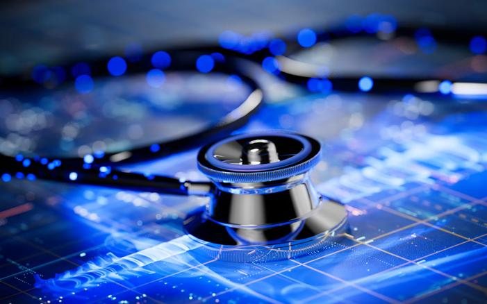Illustration of a stethoscope and computer.