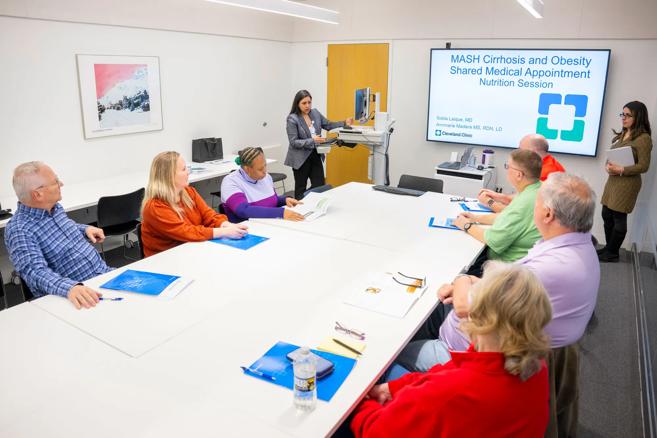 Dr. Laique leading shared medical appointment