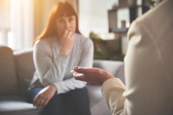 Woman and therapist talking