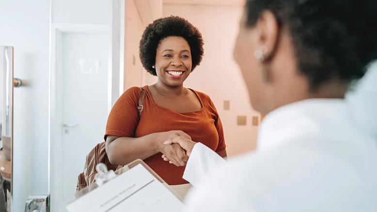 Patient greeting physician