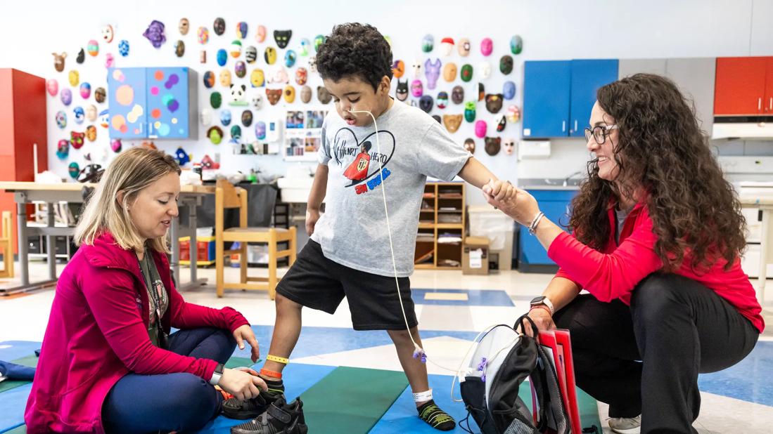 young boy in physical therapy