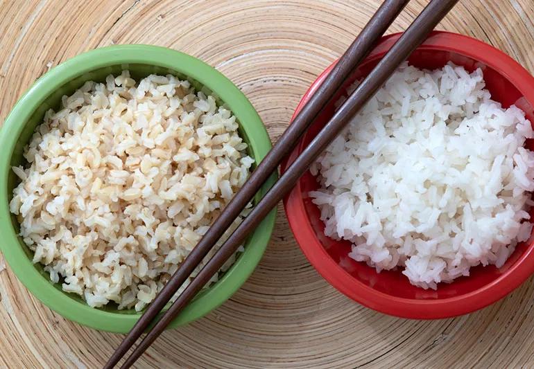 bowls of brown and white rice