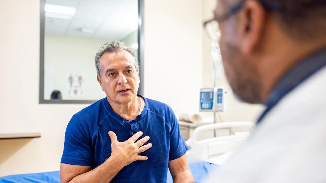 Older patient talking with healthcare provider