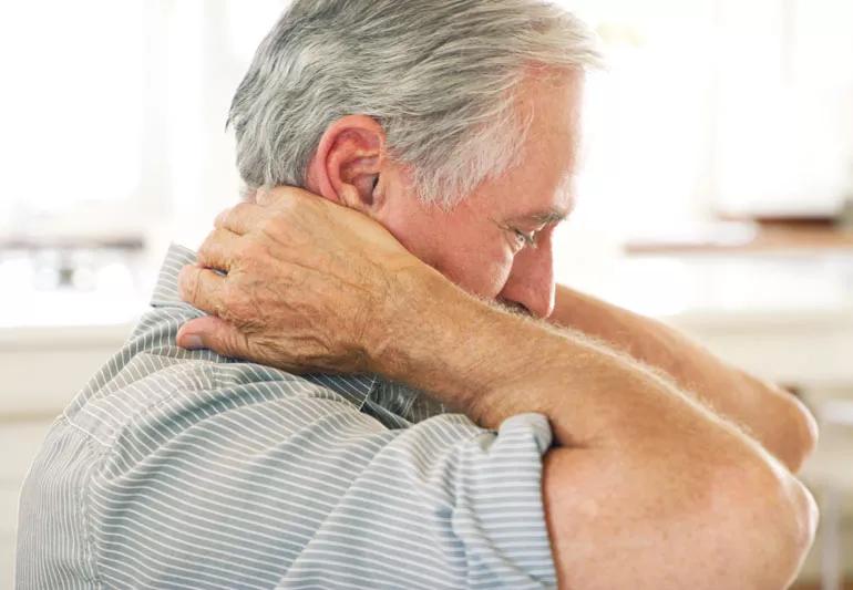 elderly man with neck pain