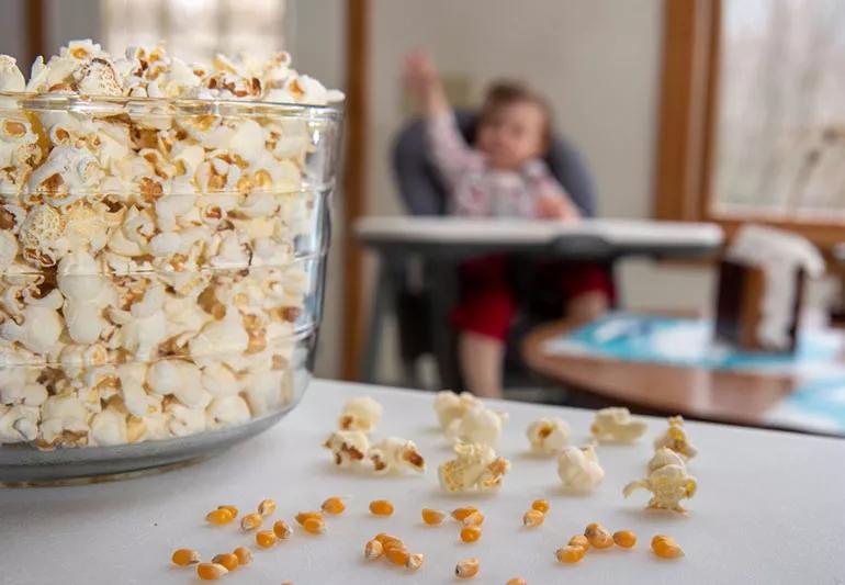 Child excited about eating popcorn