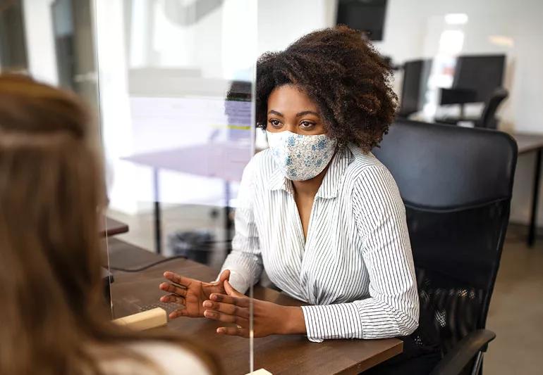 woman at work wearing cloth mask