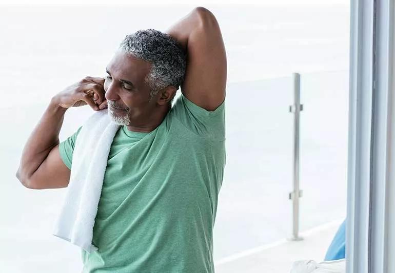 Person stretching triceps.