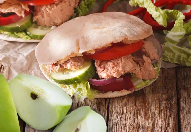 Tuna pita sandwich with apple slices