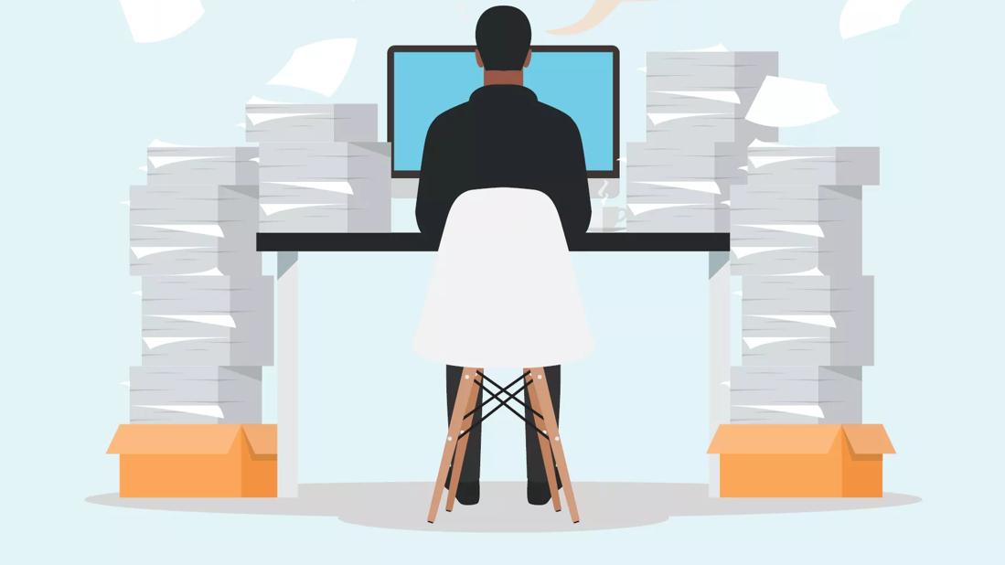 Drawing of a man sitting in front of a computer surrounded by stacks of paper