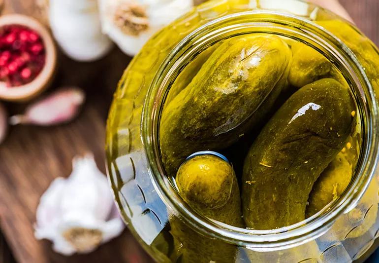 Open jar of pickles.