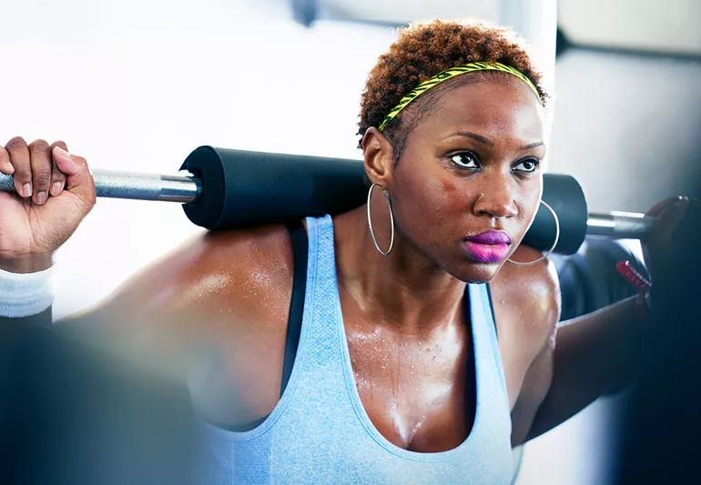 woman lifting weights