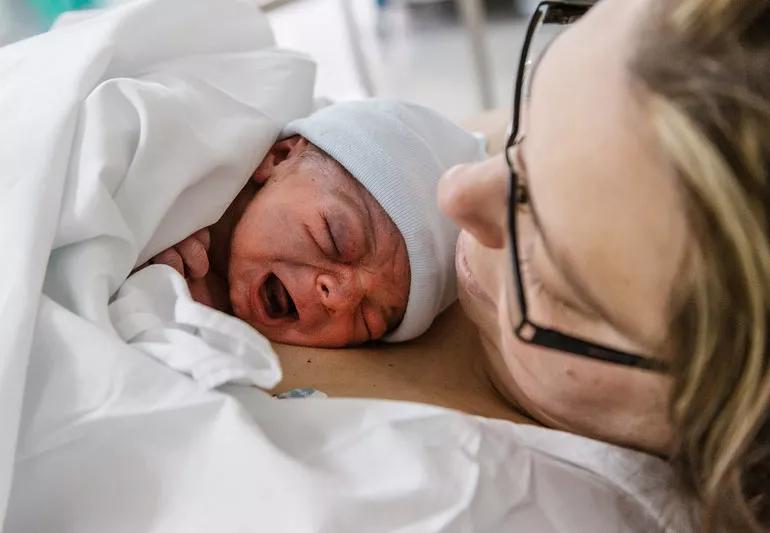 Woman giving birth during pandemic