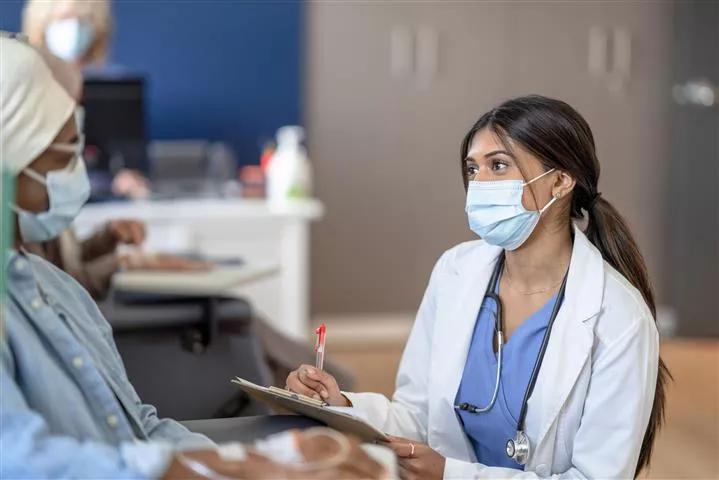 Doctor Talking with a Cancer Patient