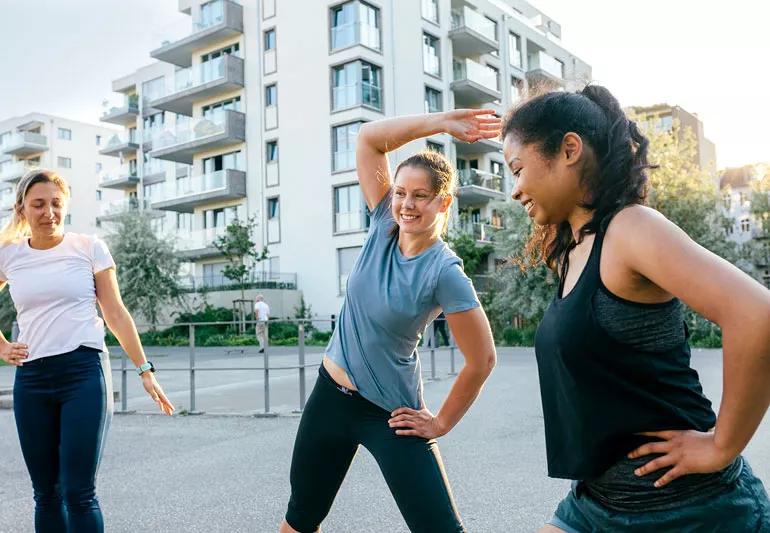 Women beginning their exercise routine outside