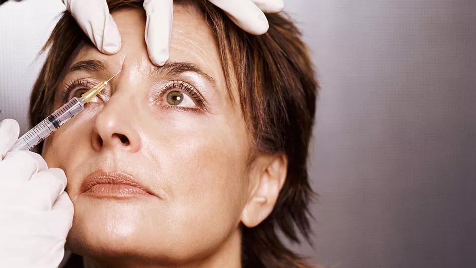 person getting forehead injections in a wrinkle