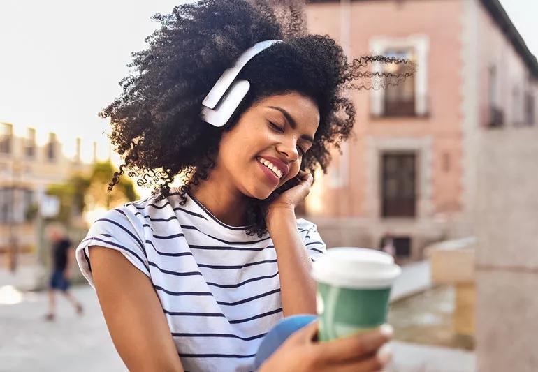 woman relaxing listening to music