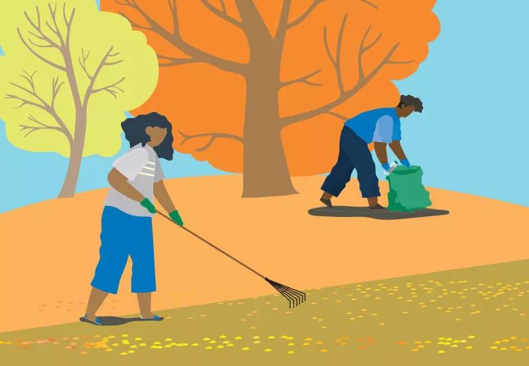 man and woman raking leaves