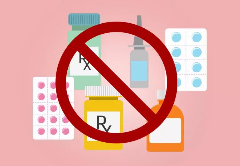 Various medications with a warning symbol over them