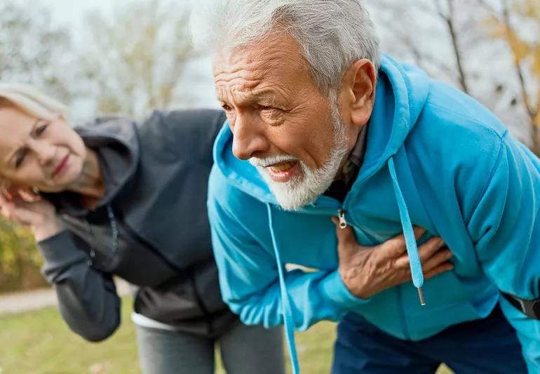 Older man having heart attack