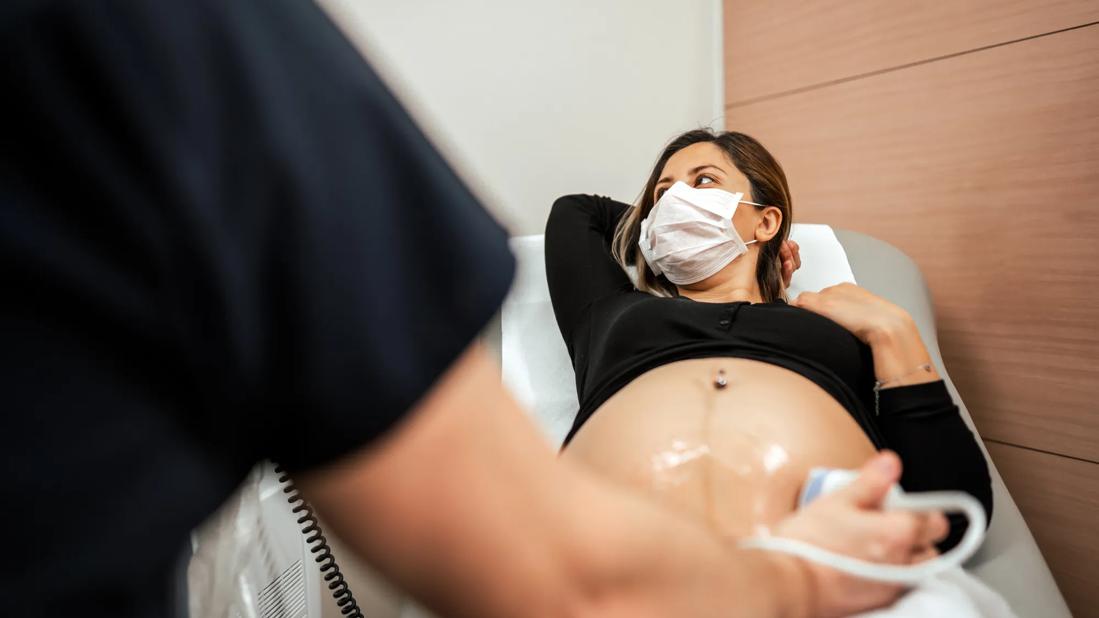 Pregnant woman getting ultrasound