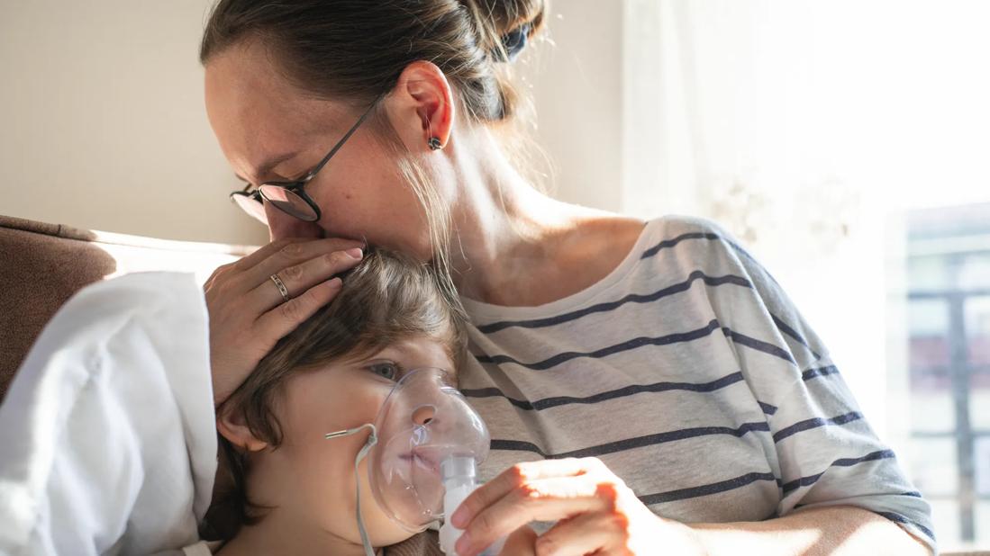 Mother comforting child