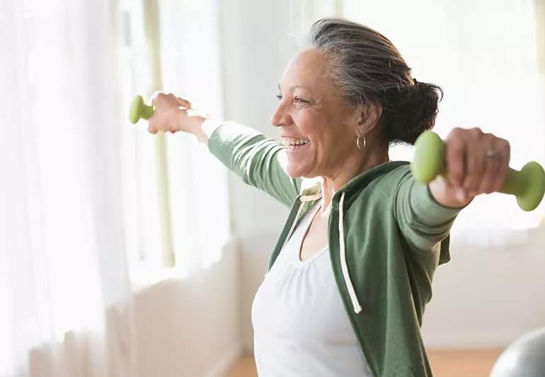 Person exercising with weights.