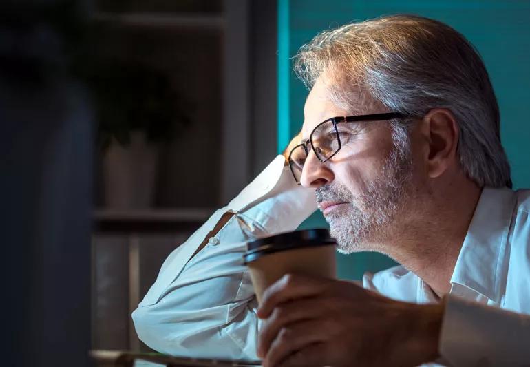 Older man still tired after waking up in morning