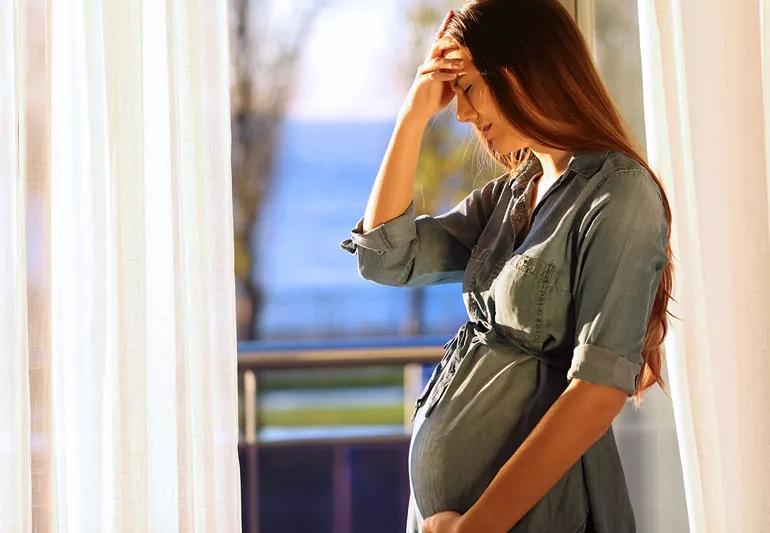 Pregnant woman suffering from a dizzy spell