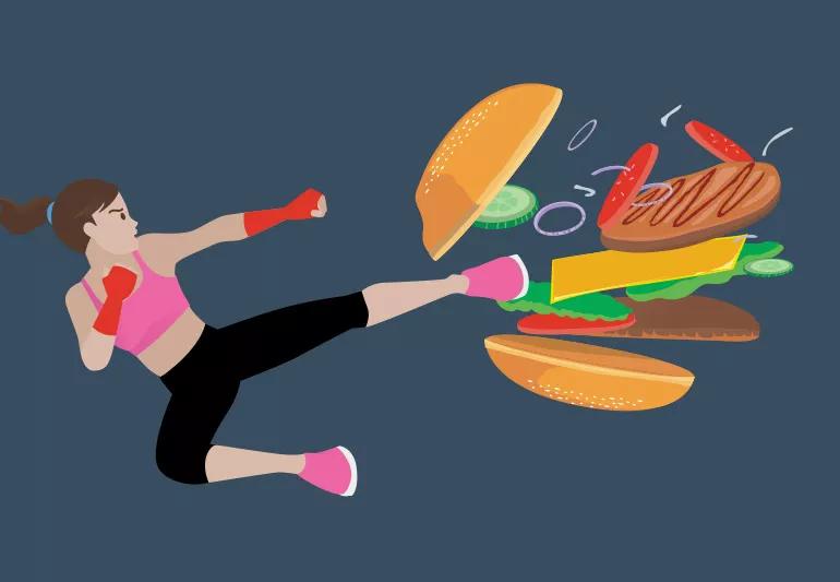 Woman kicking junk food