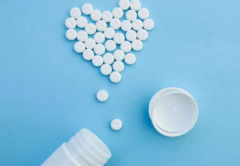 aspirin placed in the shape of a heart