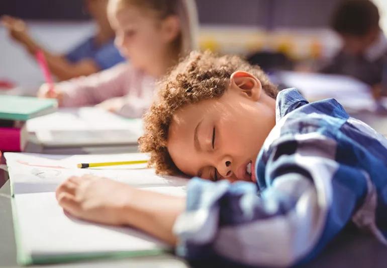 Child asleep in class