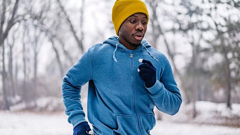 Person running in winter landscape