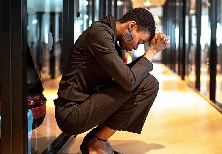 woman stressed out in hallway